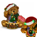 Orsetto di Natale Luminoso con Trenino Rotante e Carillon, Teddy XMAS Bear Station, Decorazione Natalizia LED in Poliresina 20,5 cm