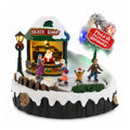 Villaggio di Natale luminoso GlideRink, pista di pattinaggio animata con musica e luci LED, decorazione in resina 20,8x20,7x17,2 cm, a batterie AA