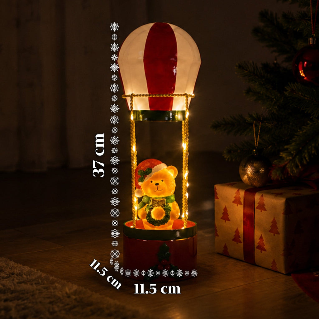 Teddy SkyFloat - Mongolfiera natalizia luminosa in metallo con orsetto, luci LED e funi dorate a batteria, alta 37 cm, con ghirlanda e agrifoglio