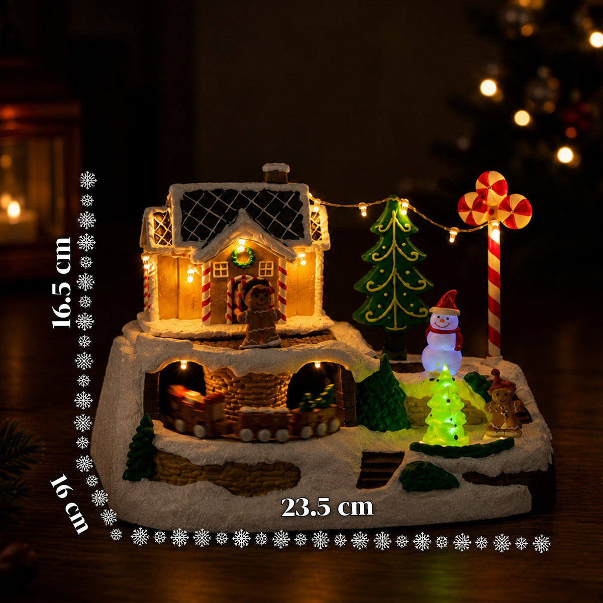 Villaggio Natalizio Luminoso Candy Town con Trenino in Movimento e 8 Melodie, Casetta Pan di Zenzero LED, Decorazione Natalizia 23,5 cm